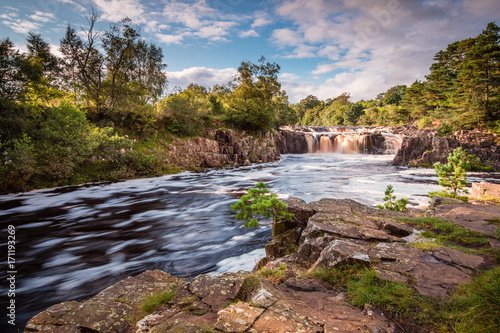 River Tees and Low Force Waterfall / The River Tees cascades over the Whin Sill at Low Force Waterfall, as the Pennine Way follows the southern riverbank