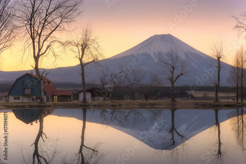 Mt.Fuji at sunrise reflect on water surface. .at Fumotoppara camping ground. photo