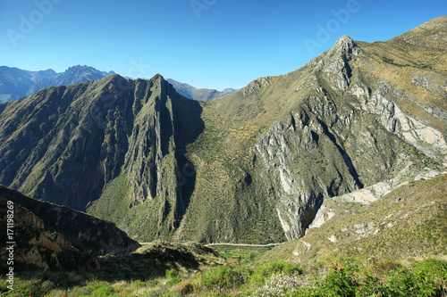 Sheer mountains in the way to ancient village of Huaquis, Peru