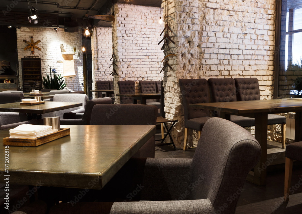 © Prostock-studio - Interior of modern restaurant, loft style © Prostock-studio - Interior of modern restaurant, loft style