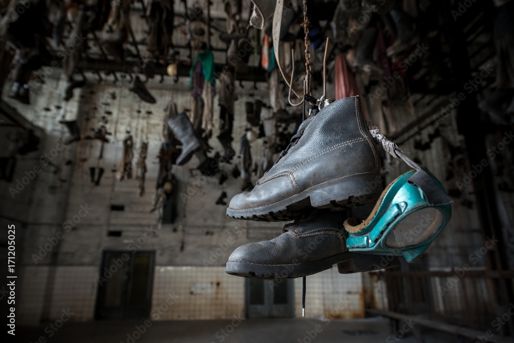 Boots in chain dressing room in Landek park