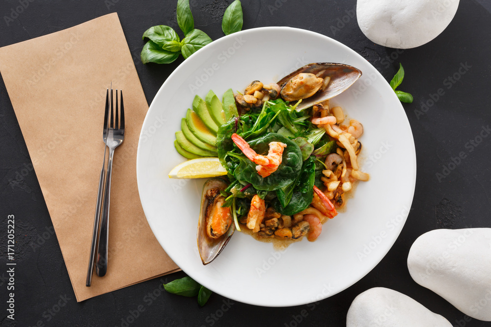Warm salad with grilled seafood flat lay Warm salad with grilled seafood flat lay