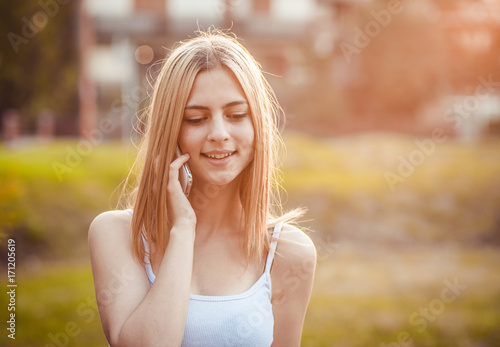 Girl talking on phone and smiling