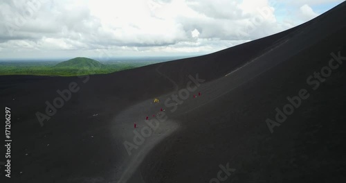 Cerro volcano in Nicaragua. People after sliding board on volcano aerial drone view