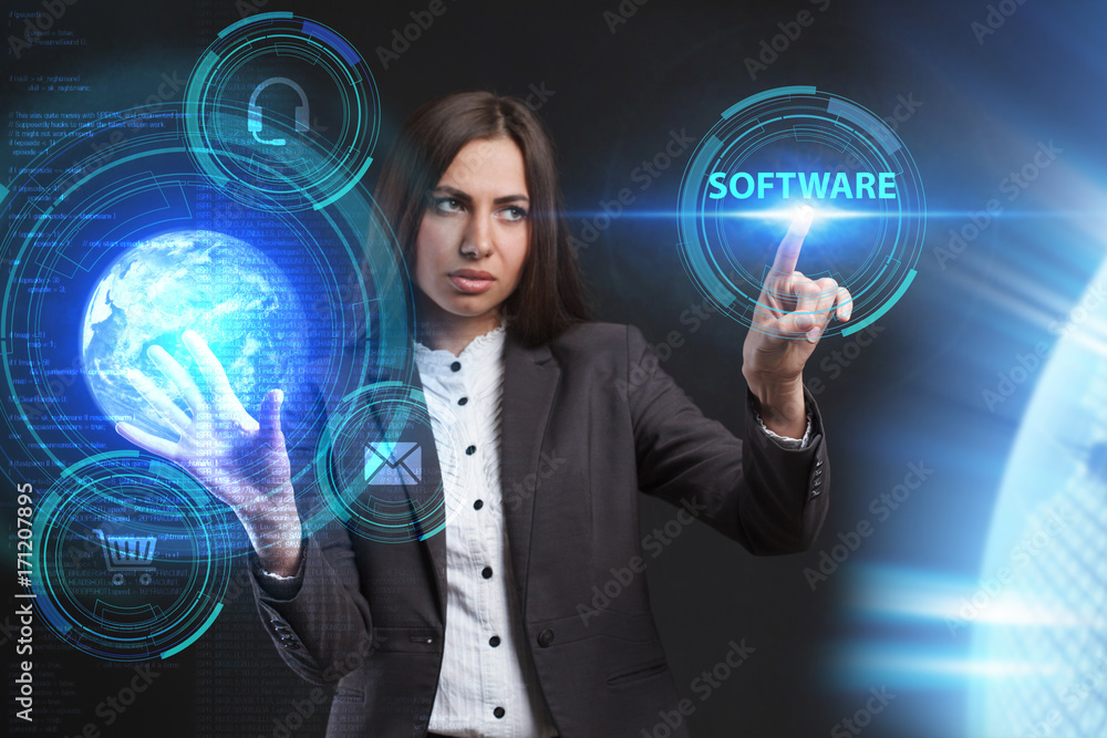 The concept of business, technology, the Internet and the network. A young entrepreneur working on a virtual screen of the future and sees the inscription: Software The concept of business, technology, the Internet and the network. A young entrepreneur working on a virtual screen of the future and sees the inscription: Software