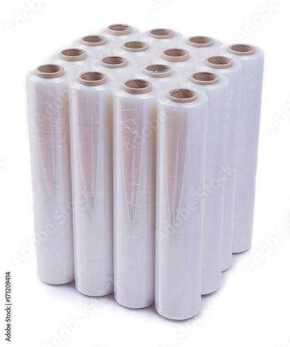 Vertically oriented rolls of stretch film on white background.