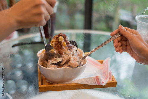 Cool bread taste Ovaltine the volcano. Being eaten subject is blurred. photo