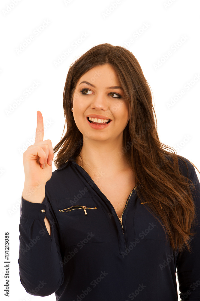 attractive young woman pointing to copy space isolated over white background attractive young woman pointing to copy space isolated over white background