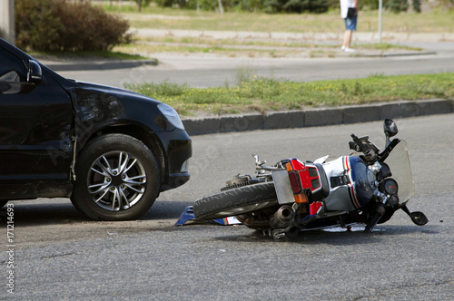 Fototapeta crash moto bike and car on road