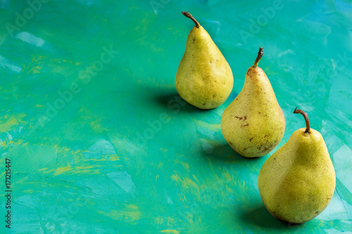 Fresh Pear fruit on a collorfull background. Concept of healthy eating. photo