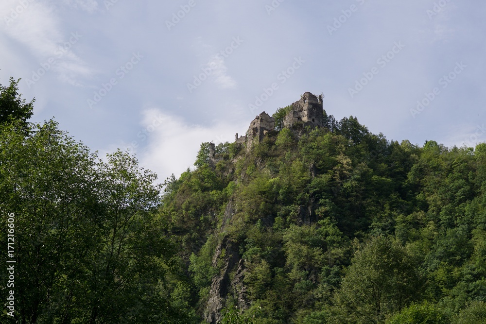 Castle on the rock in the woods. Slovakia