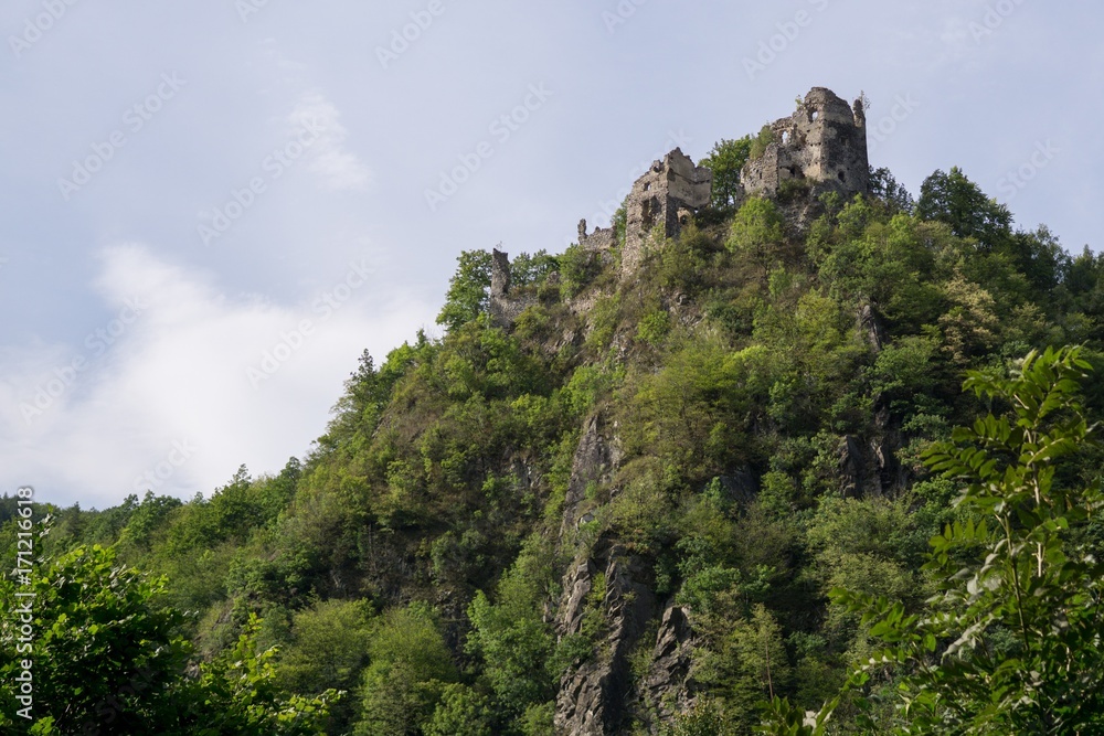 Castle on the rock in the woods. Slovakia