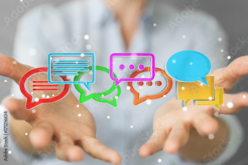 Businesswoman using digital colorful 3D rendering conversation icons