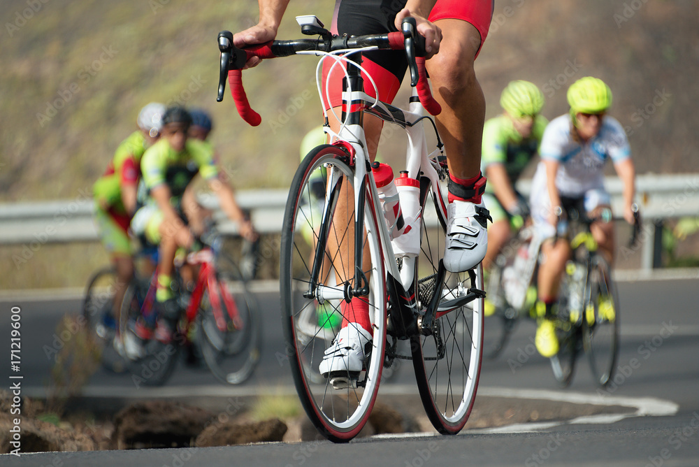 Obraz premium Cycling competition,cyclist athletes riding a race at high speed