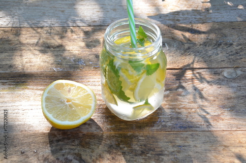 Lemon mojito cocktail with mint lemonade, cold refreshing drink or beverage, ice photo