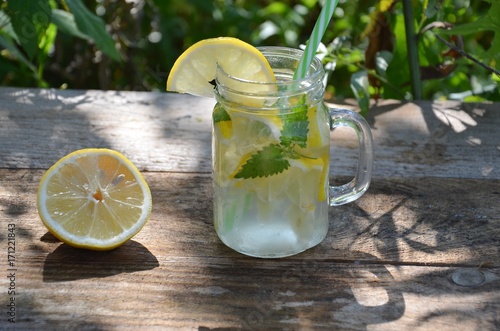 Lemon mojito cocktail with mint lemonade, cold refreshing drink or beverage, ice photo