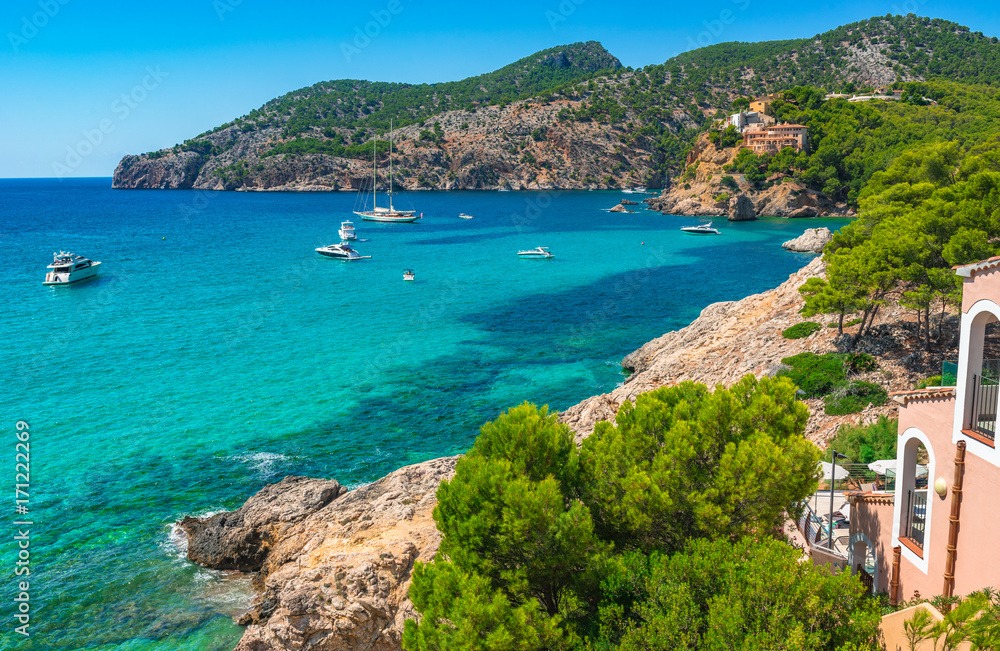 Beautiful coast bay with boats in Camp de Mar on Majorca island, Spain Mediterranean Sea