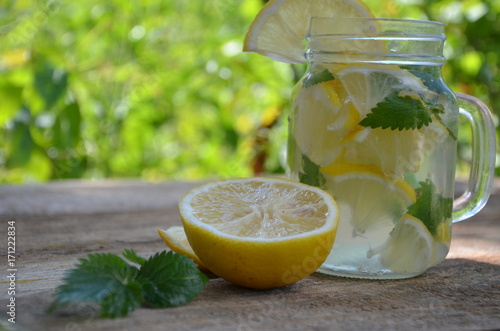 Lemon mojito cocktail with mint lemonade, cold refreshing drink or beverage, ice photo