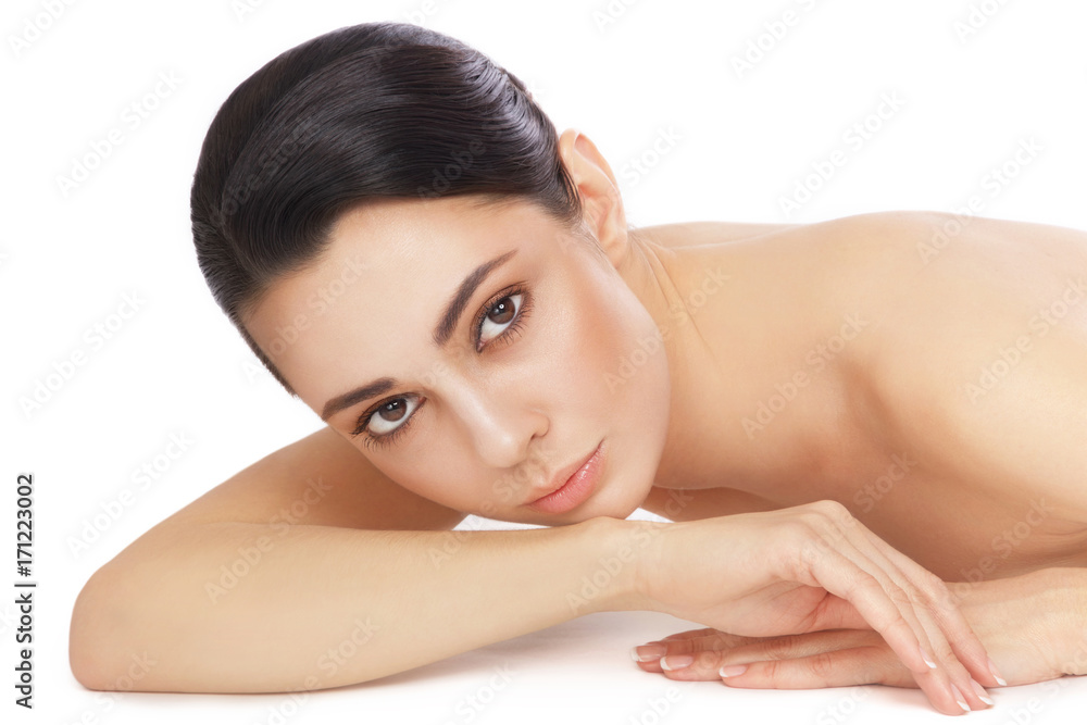 Young beautiful healthy woman lying on white background, copy space Young beautiful healthy woman lying on white background, copy space