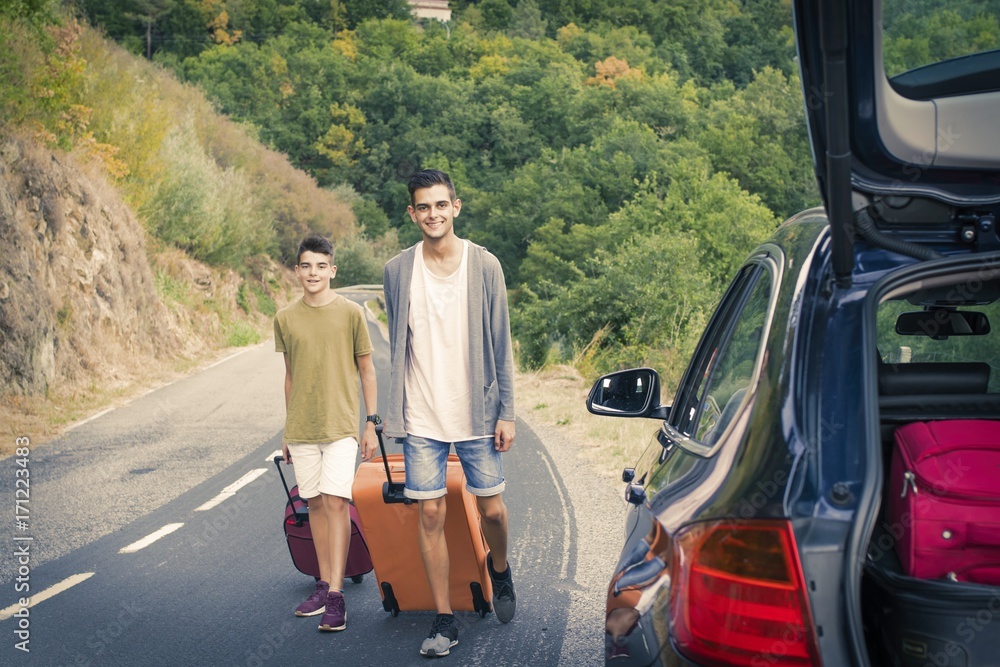 people travelling by car, holidays and luggage people travelling by car, holidays and luggage