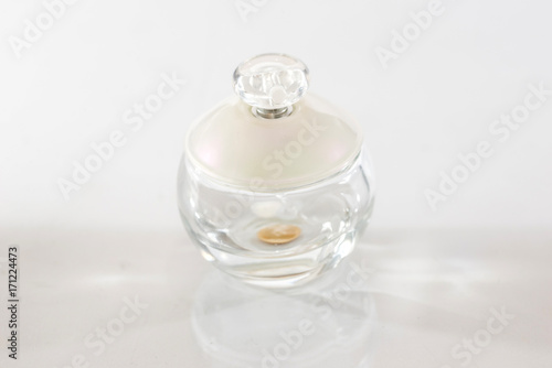 bottle with perfume isolated on white background
