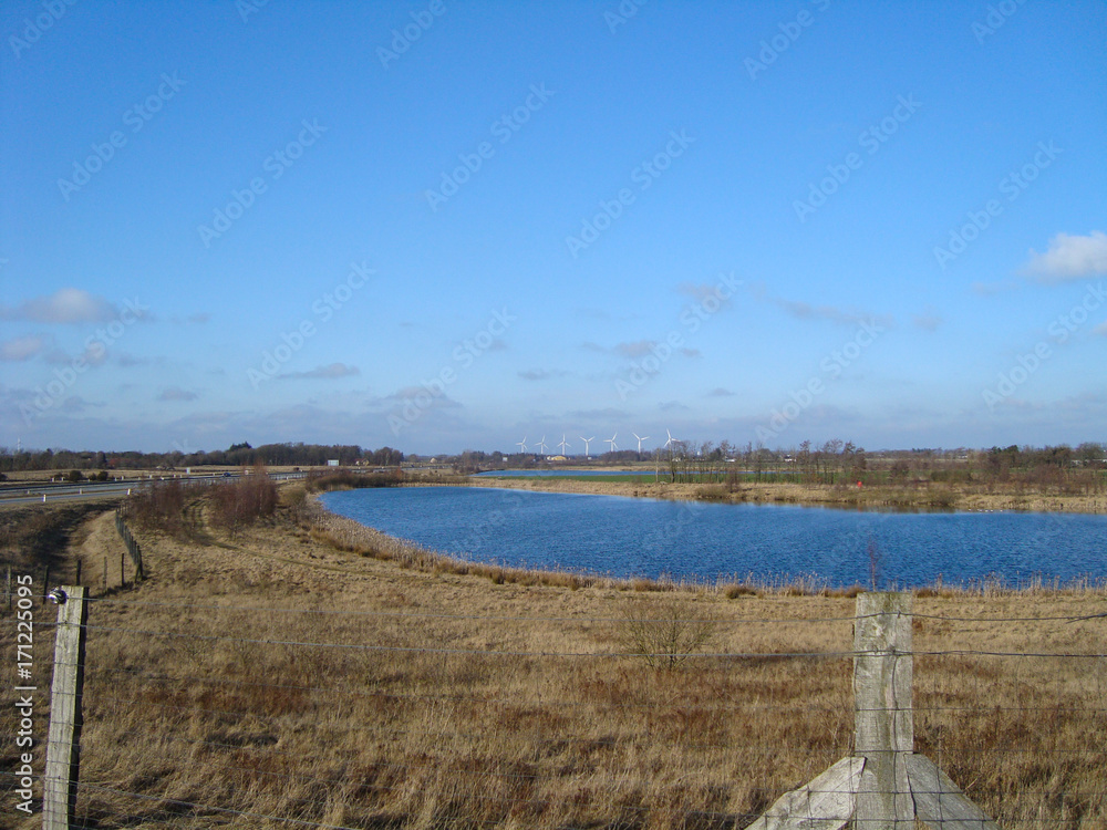 Lake near a highway in the Danish countryside