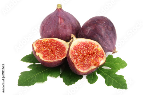 fig fruits with leaves isolated on white background