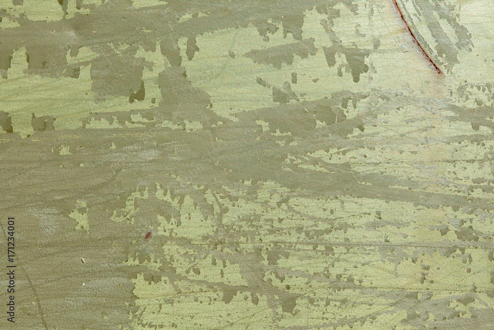 Old metal green military  painted background with streaks of rust.