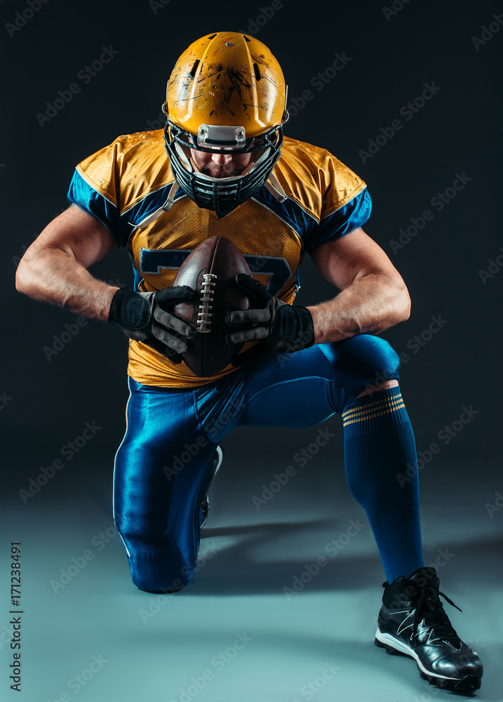 American football offensive player with ball
