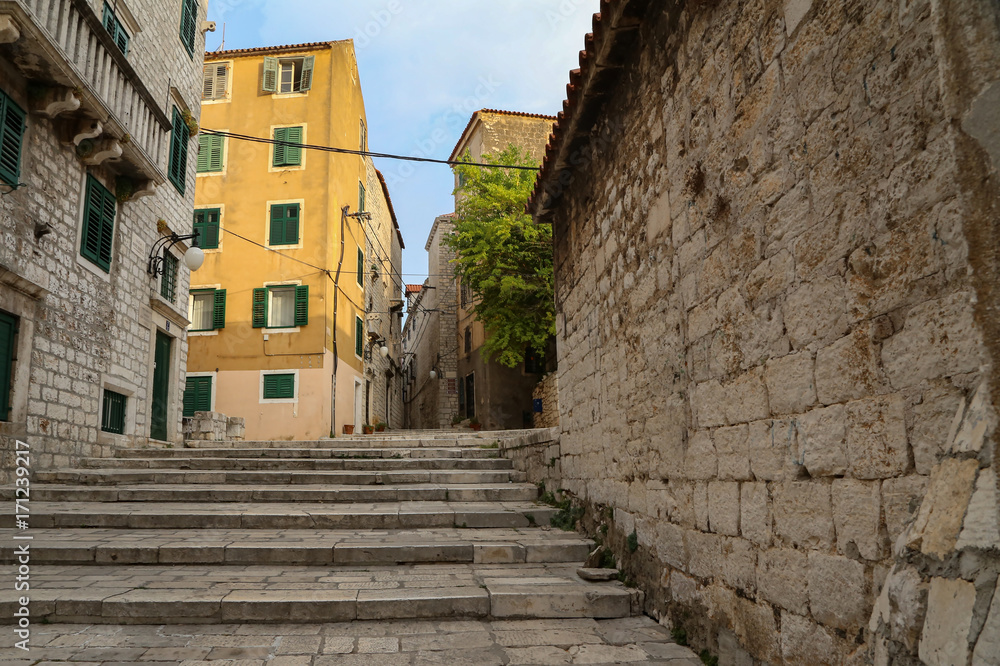 Sibenik / Tourist city by the Adratic sea - Sibenik, Croatia. The old stones, narrow street and stairs.