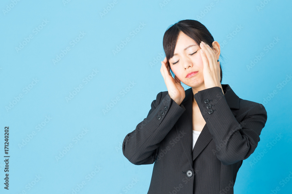portrait of asian businesswoman isolated on blue background portrait of asian businesswoman isolated on blue background
