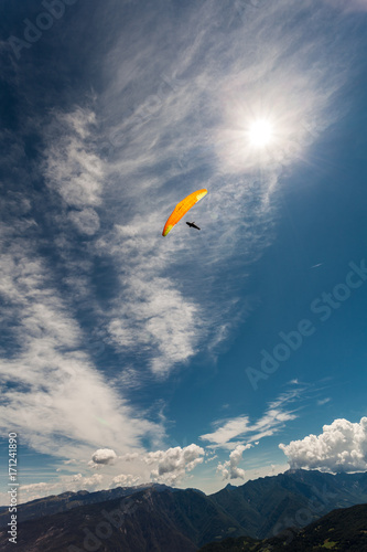 Paragliding in the sky over the dolomites