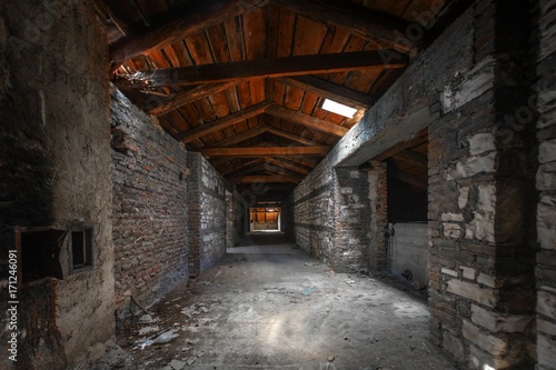 Creepy attic interior at abandoned building