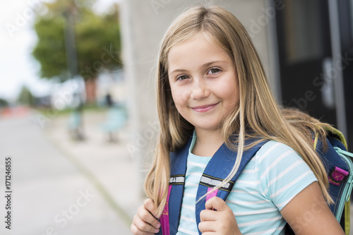 nine years old girl student at school