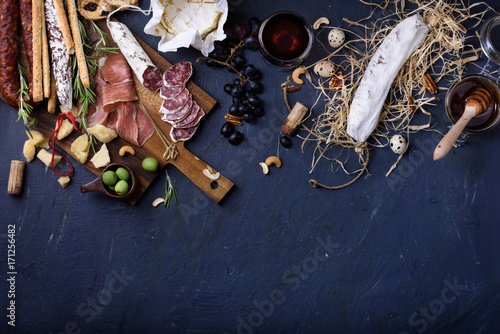 Appetizer, italian antipasto, Ham, Olives, Cheese, Grissini bread sticks