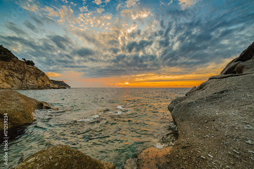 Scenic coastal sunset on island of Elba in Tuscany