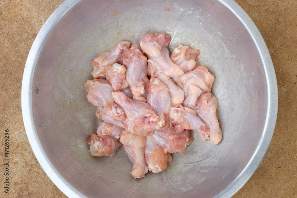 Raw chicken wings prepare for cooking.