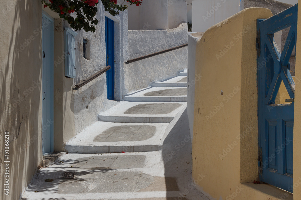 Naklejka premium Street in Megalachori village, Santorini island, Greece