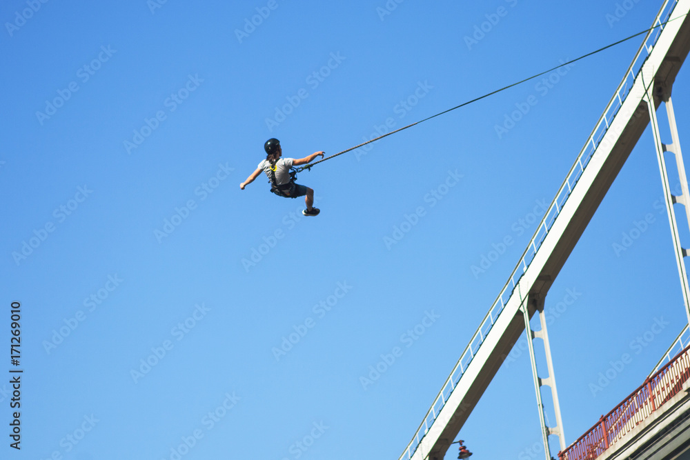 Rope Jumping: people in flight from a height. Rope Jumping: people in flight from a height.