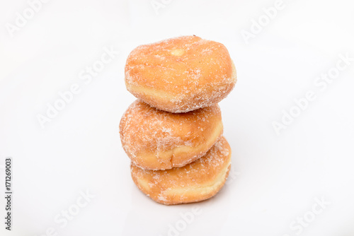 Homemade donuts isolated on white background.