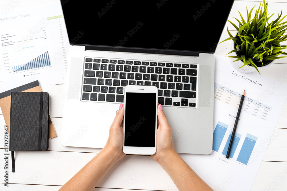 Modern office desktop with business woman hands. Close up Modern office desktop with business woman hands. Close up