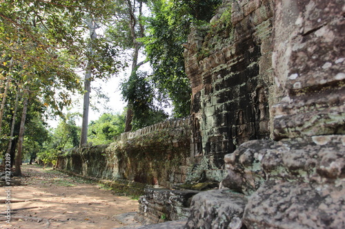 Ruins and walls of an ancient city in Angkor complex  near the ancient capital of Cambodia - Siem Reap