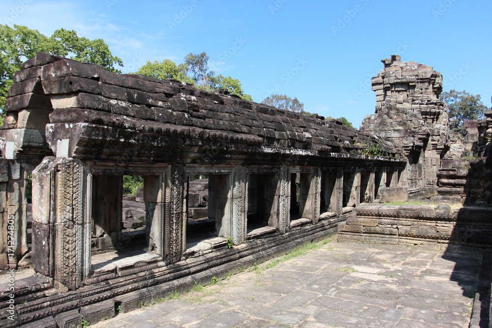 Ruins and walls of an ancient city in Angkor complex, near the ancient capital of Cambodia - Siem Reap