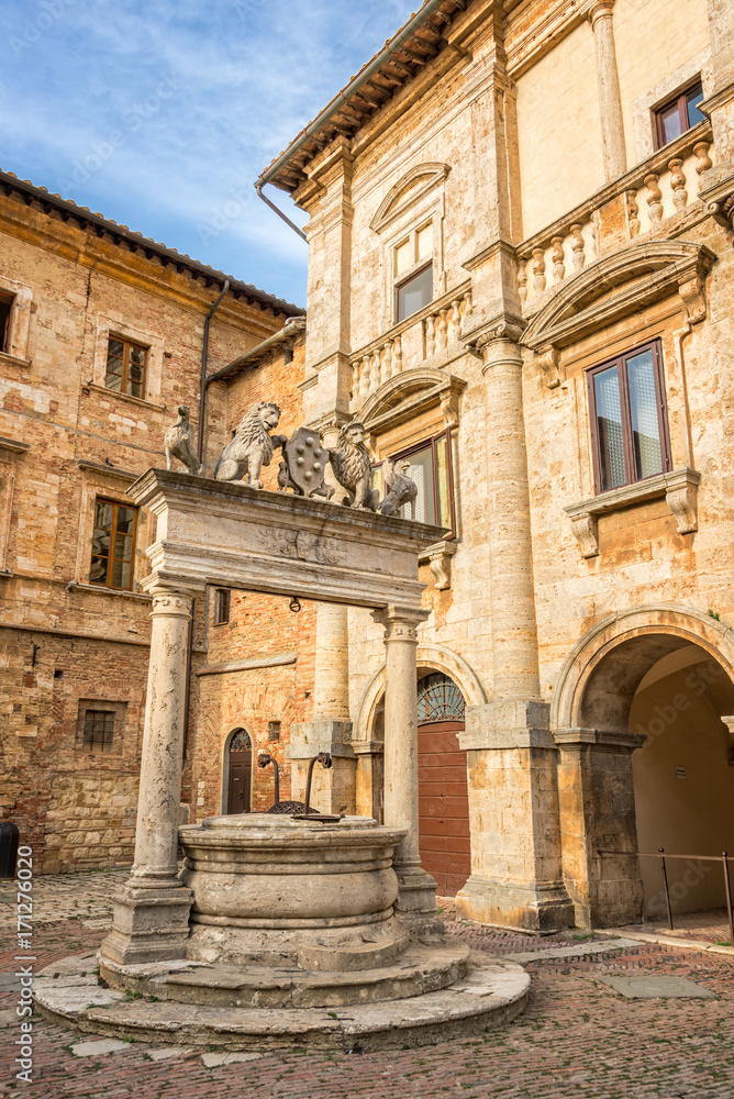 The Griffin and Lion well in the old medieval town of  Montepulciano in Tuscany Italy. Montpulciano is famous for its wine.