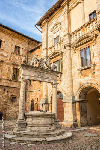 The Griffin and Lion well in the old medieval town of  Montepulciano in Tuscany Italy. Montpulciano is famous for its wine. © Delphotostock