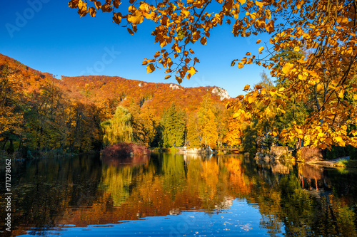 Park with a lake in autumn colors in the spa town Rajecke Teplice in Slovakia, Europe.