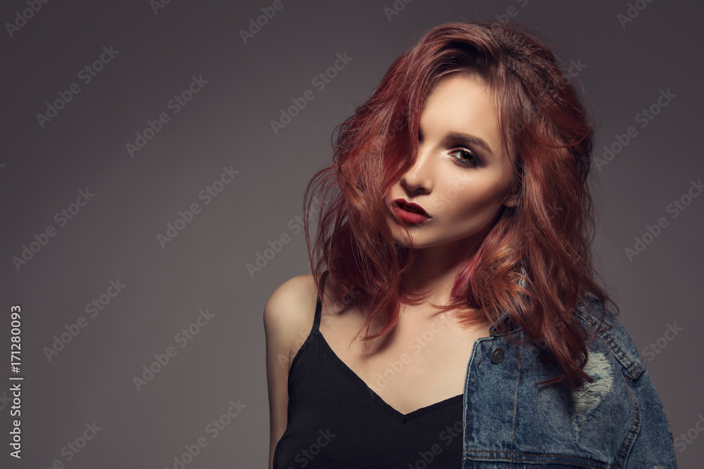 Portrait of woman with long curly beautiful ginger hair. Portrait of woman with long curly beautiful ginger hair.
