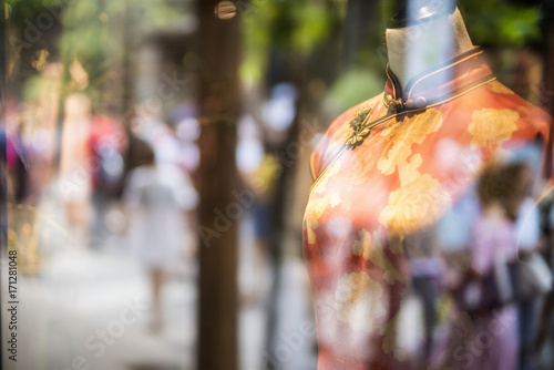 cheongsam(qipao), chinese traditional dress for women exhibited on store photo