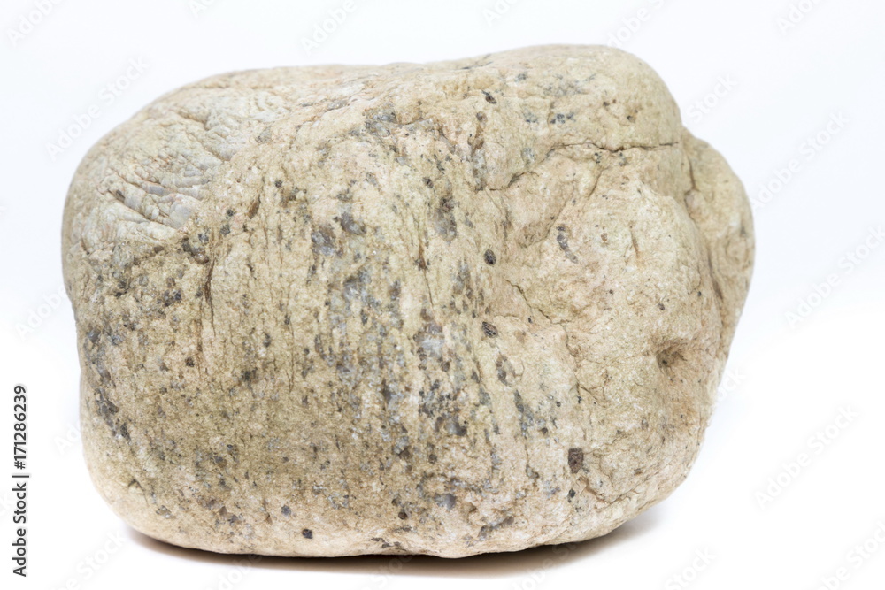 Single natural stone on white background Single natural stone on white background