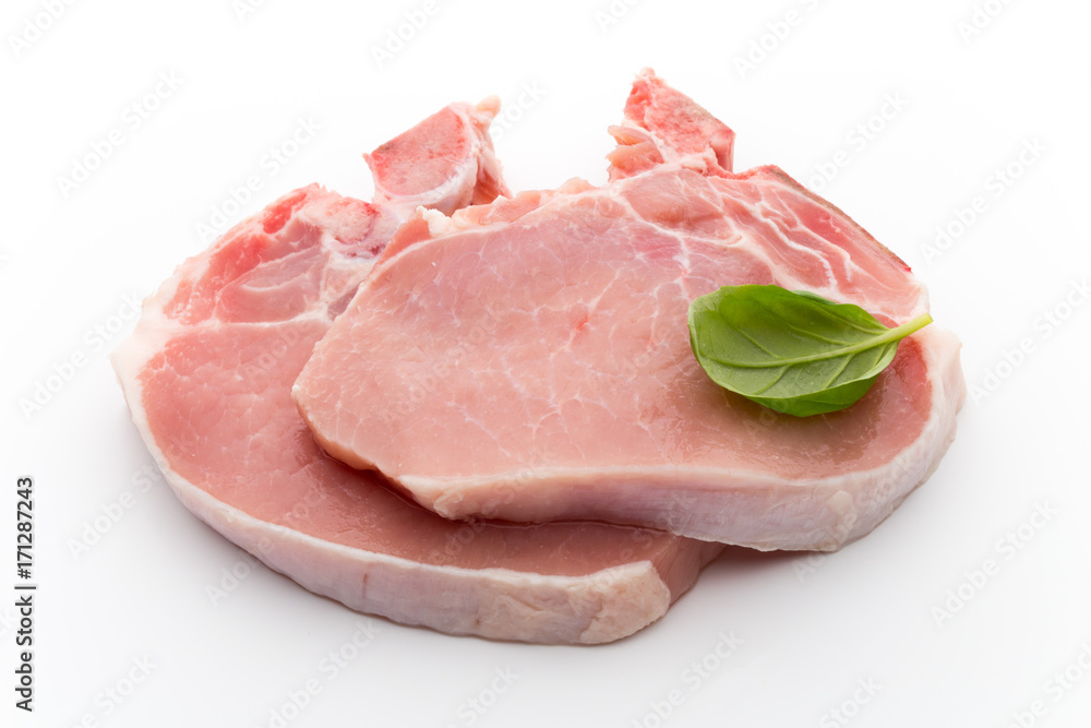 Fresh raw beef steak isolated on white background, top view.